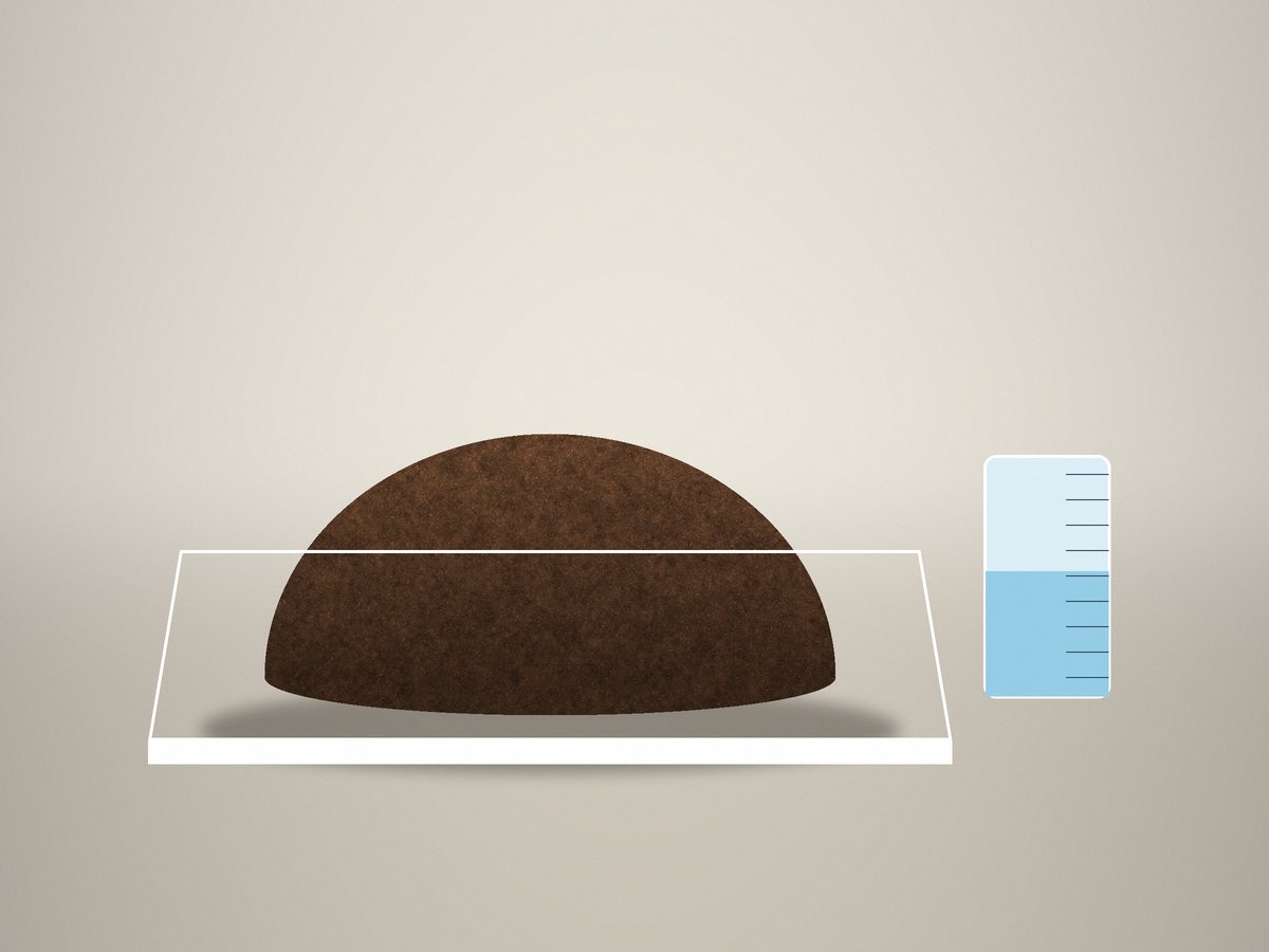 Expanded coco peat with a measured amount of water
